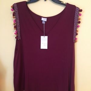 A new day burgundy shirt with poms on sleeves XL